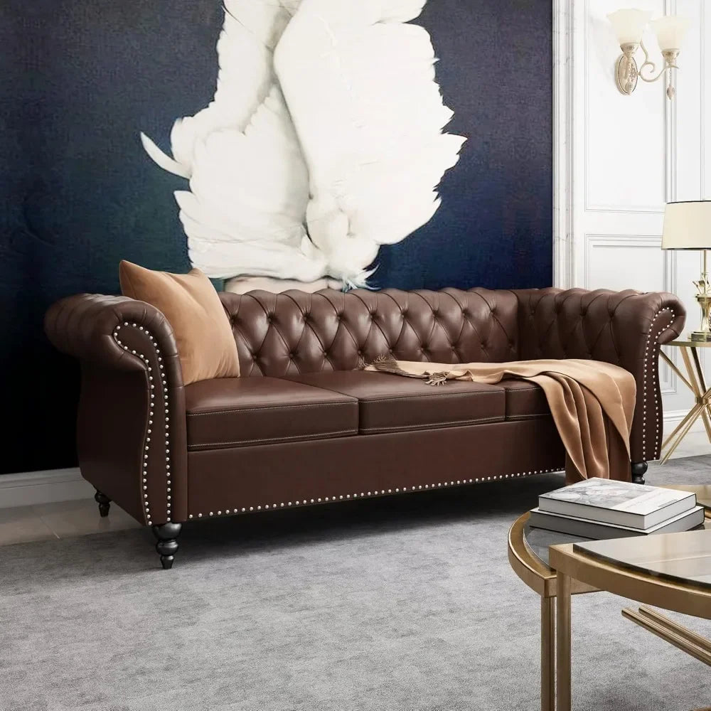 chesterfield style leather sofa and loveseat set with scroll arms and nailhead trim for living room or office
